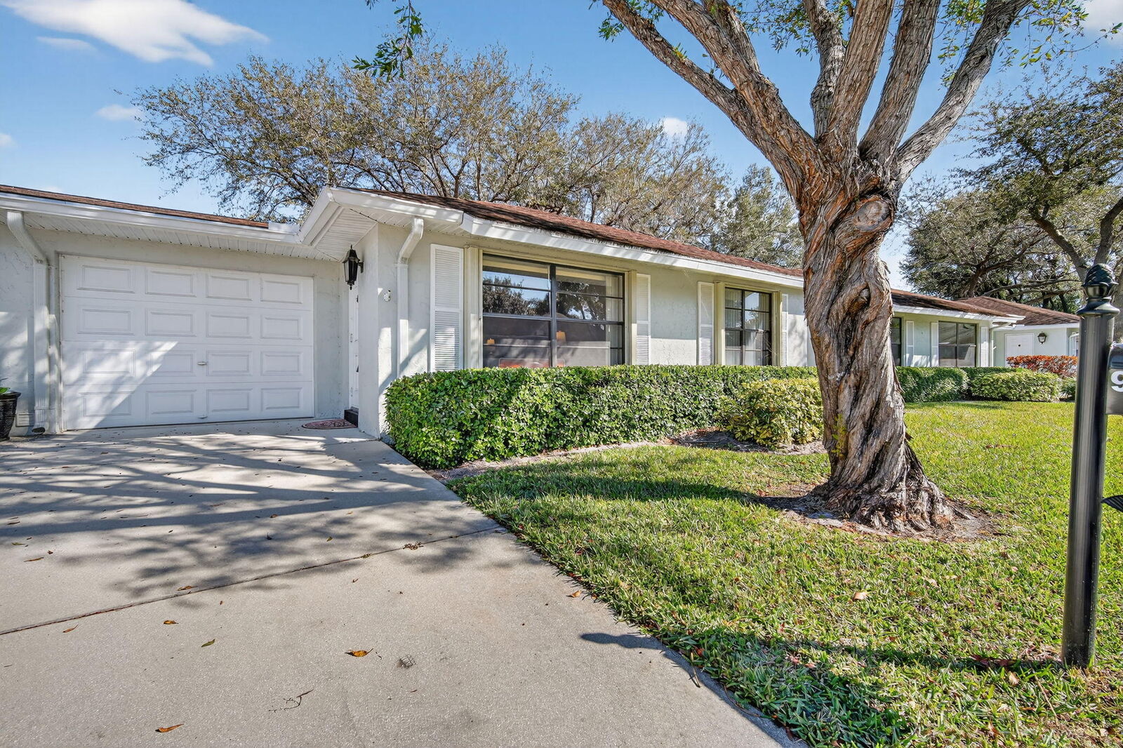 Property Photo:  9890 Orchid Tree Trail B  FL 33436 