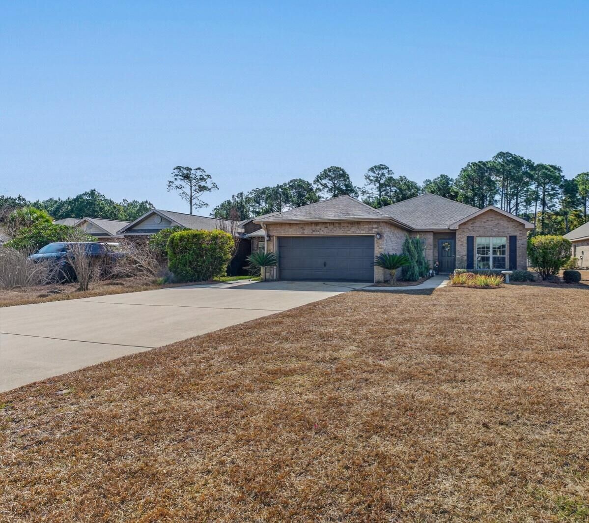 Property Photo:  864 Cocobolo Dr  FL 32459 
