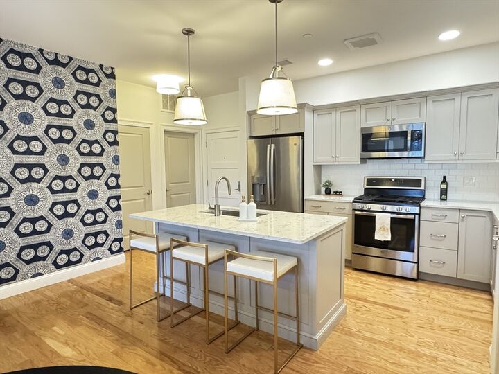 Property Photo: 1 Revolution Way 307 MA 02021