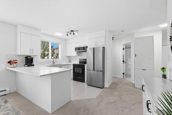 Photo de la propriété:  7451 Springbank Boulevard SW 1211  AB T3H 4K5 
