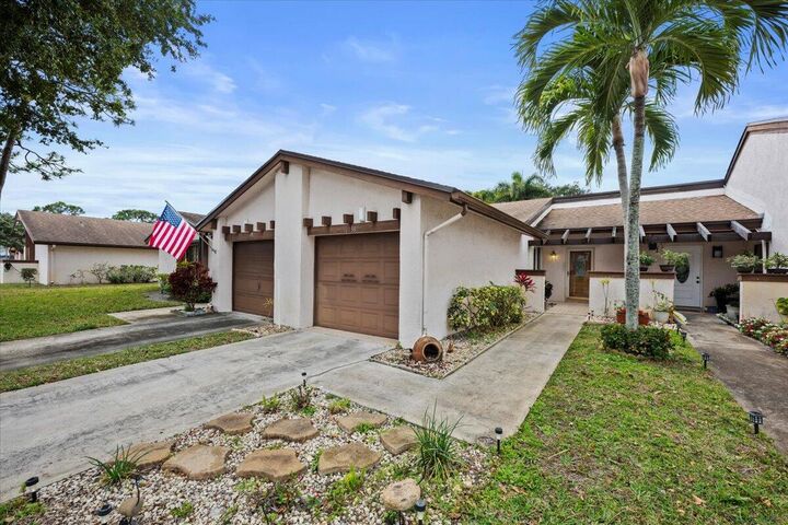 Property Photo:  6138 Elsinore Circle  FL 33463 