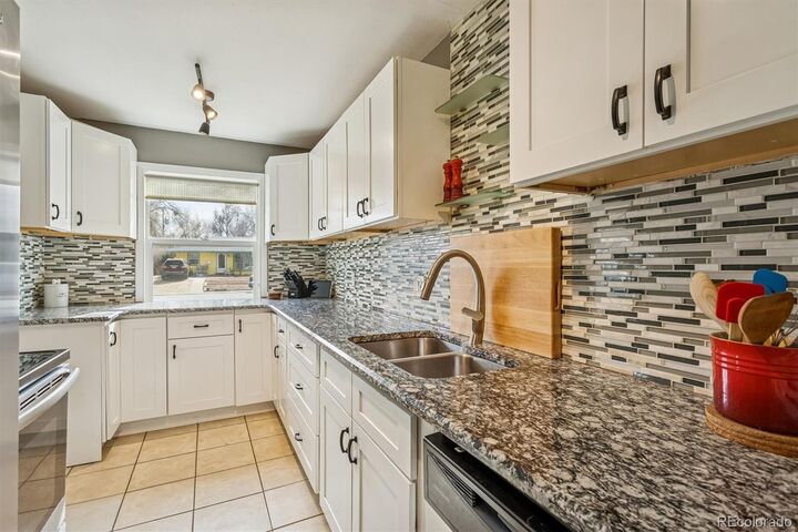 Property Photo: 4841 E Missouri Avenue CO 80246