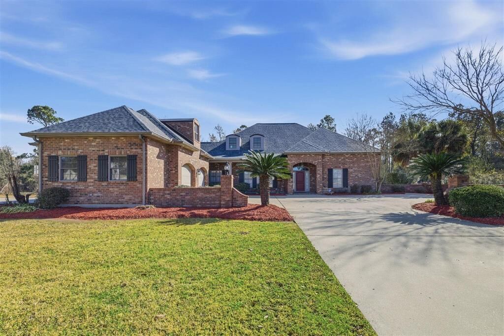 Property Photo:  4817 Riverview Lane  LA 70605 