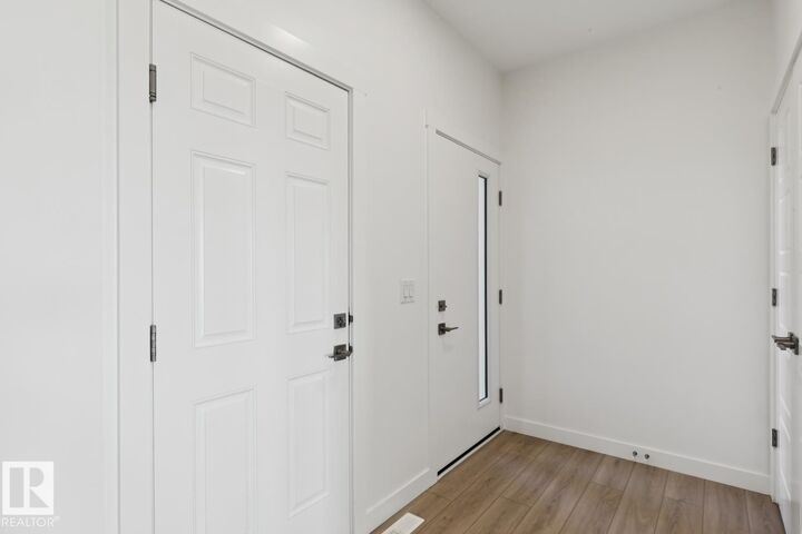 Property Photo:  8616 183 Avenue NW  AB T5Z 0X5 
