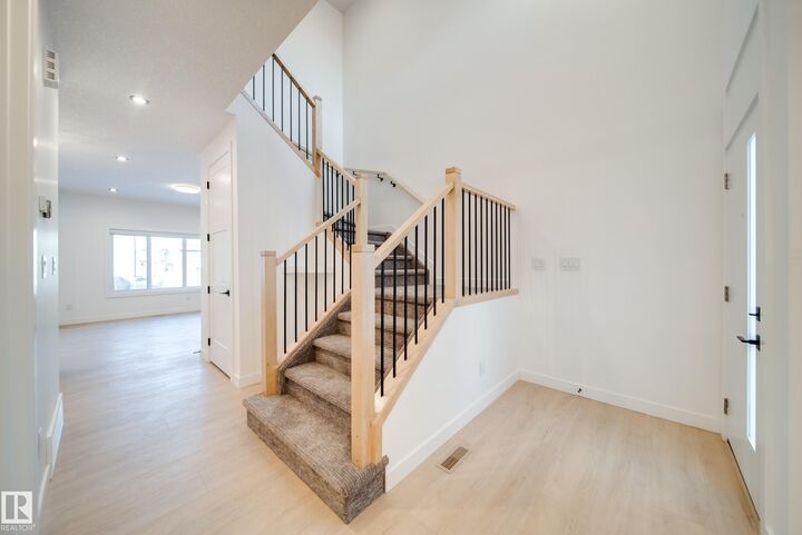 Property Photo:  22 Blackbird Bend  AB T8L 0G6 