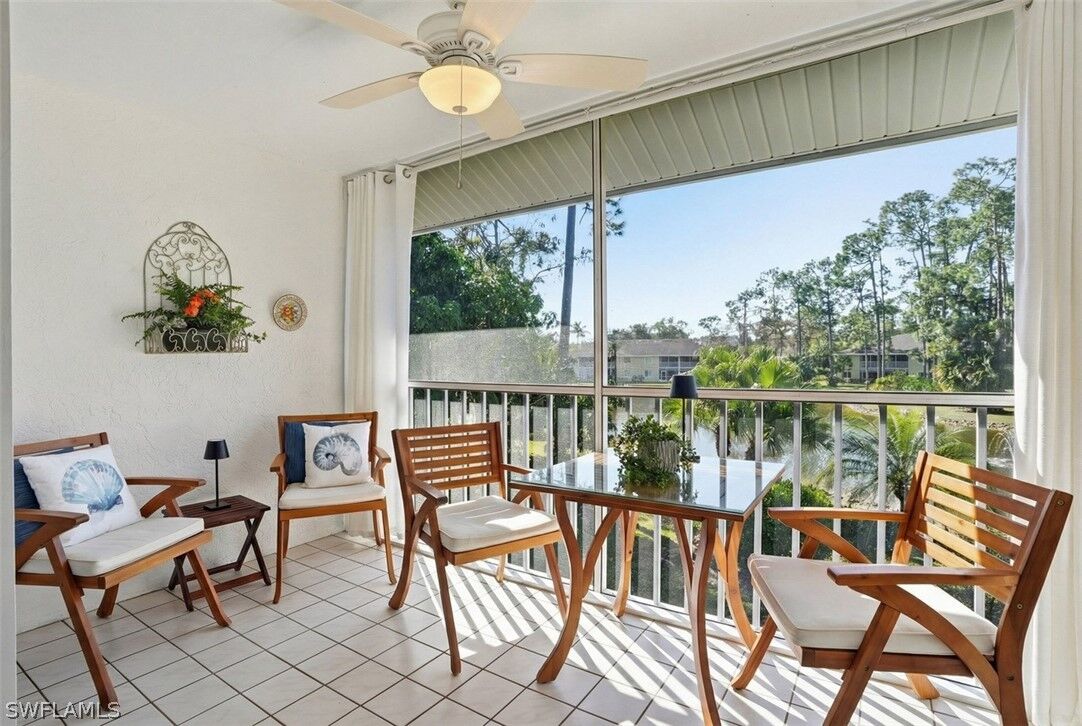 Property Photo:  5654 Woodmere Lake Circle C203  FL 34112 