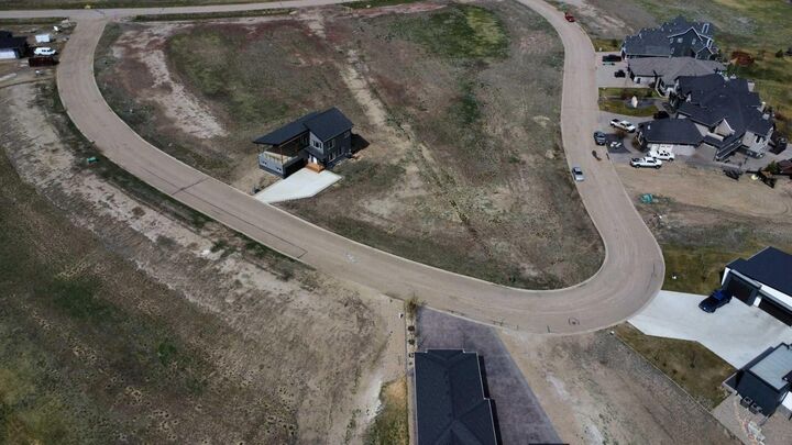 Property Photo: 29 Kingfisher Estates Drive AB T1R 0X5