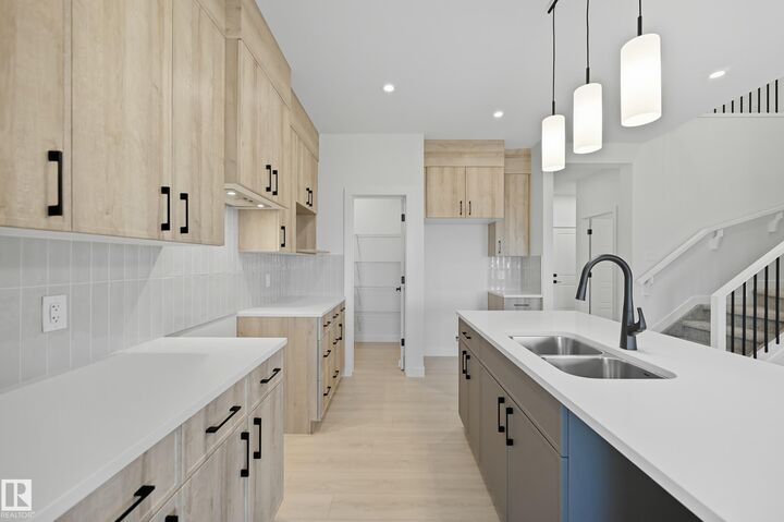 Property Photo:  8909 223A Street NW  AB T5T 7X2 