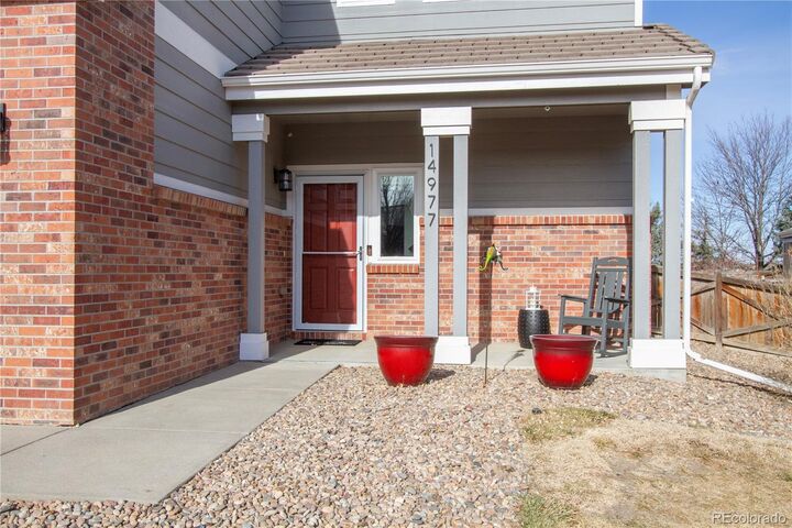 Property Photo: 14977 E 119th Avenue CO 80603