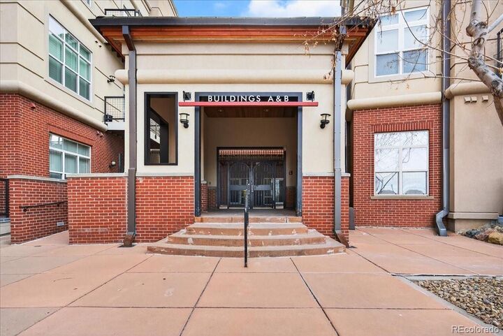 Property Photo: 5677 S Park Place 103 CO 80111