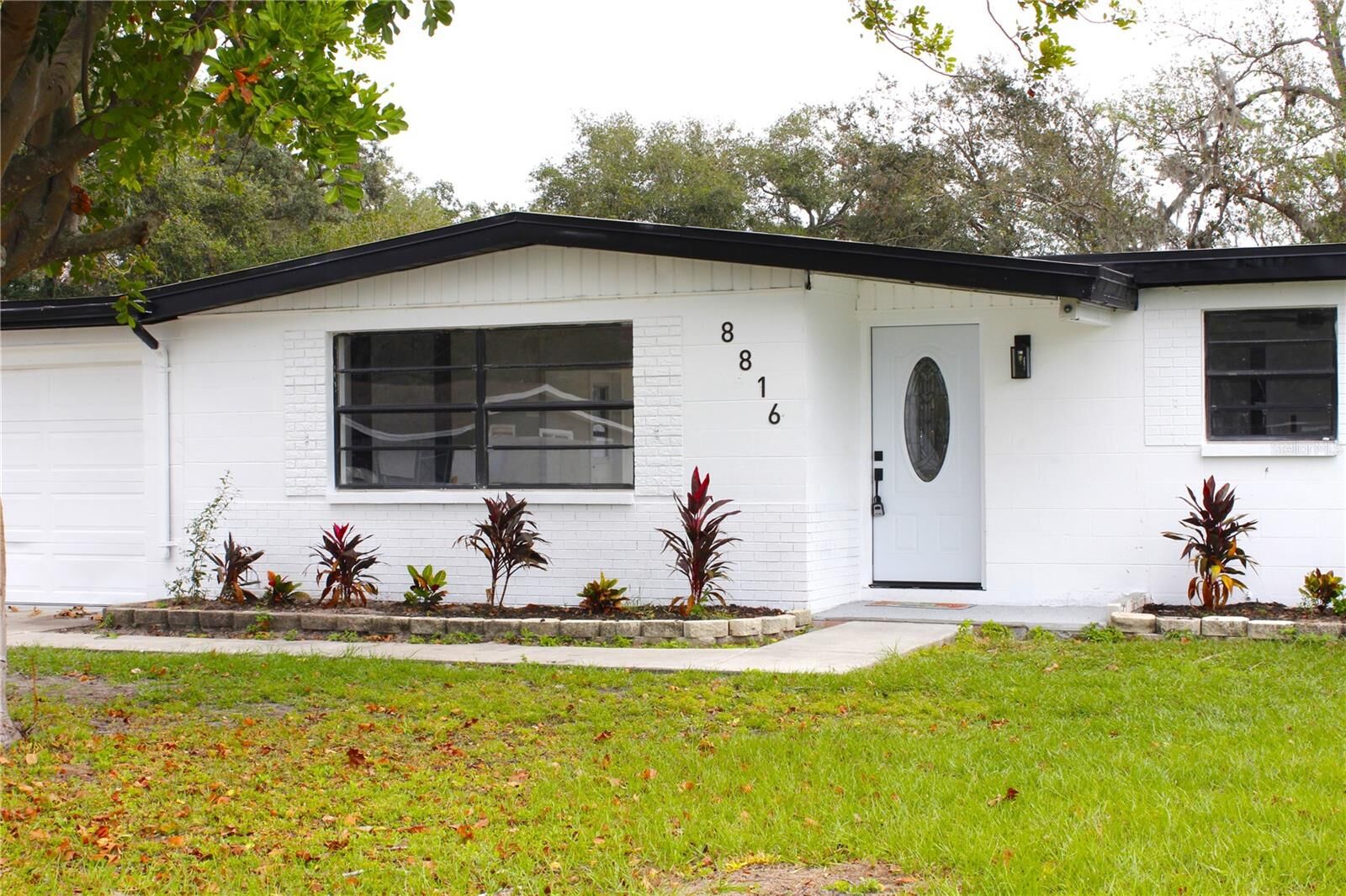 Property Photo:  8816 Ashman Road  FL 33578 