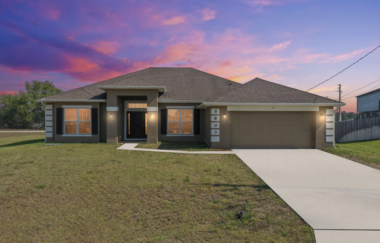 Property Photo:  5803 NW Dooley Circle  FL 34953 