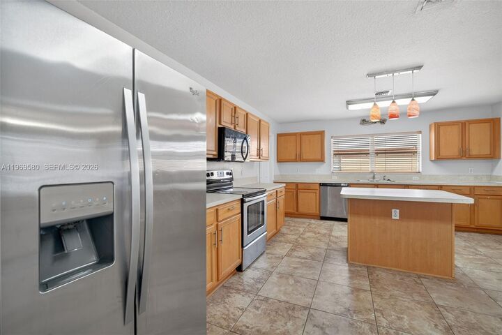 Property Photo:  6762 NW Daffodil Ln  FL 34983 