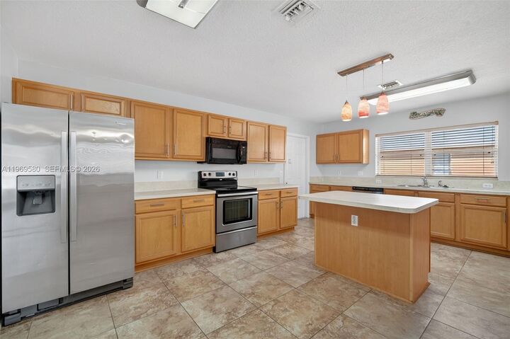 Property Photo:  6762 NW Daffodil Ln  FL 34983 