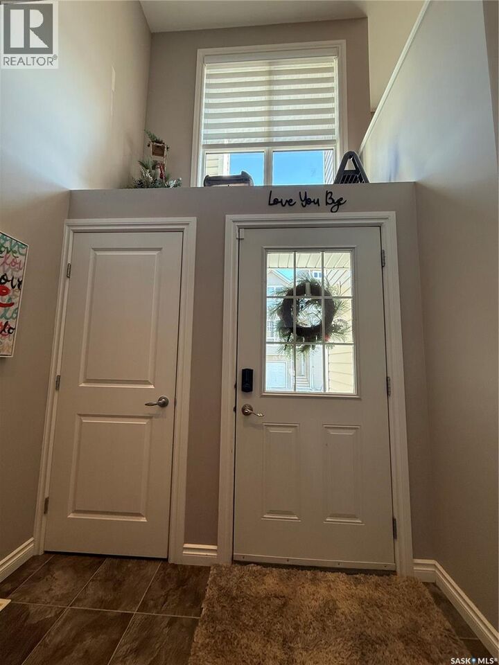 Property Photo: 2 697 Sun Valley Drive SK S4A 2X7