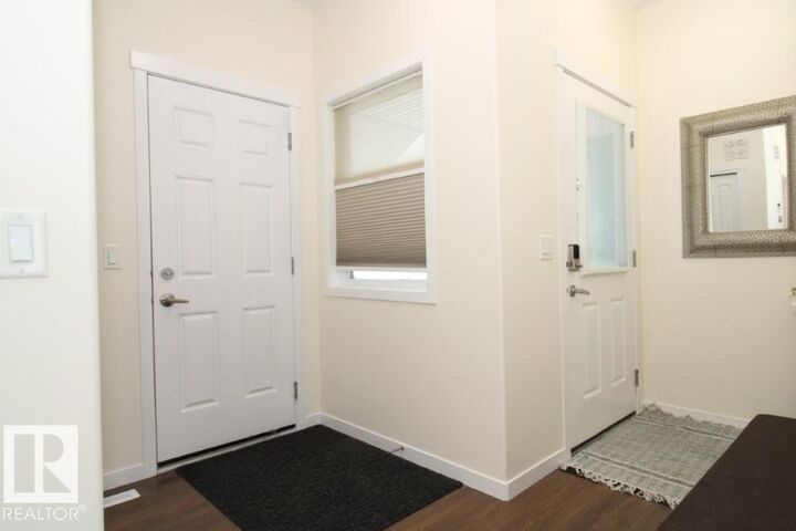 Property Photo: 3043 Checknita Wy SW AB T6W 3X8