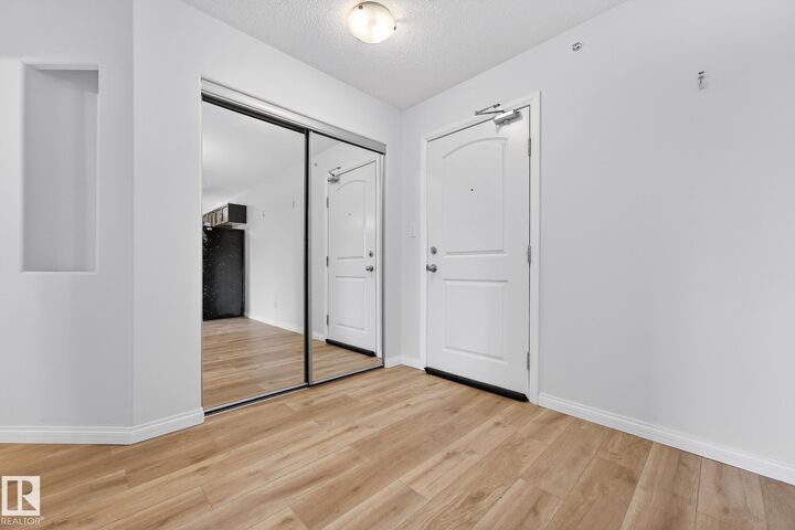 Property Photo: 1204 156 Street NW 416 AB T6R 0R6