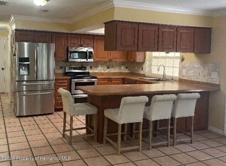 Property Photo:  18816 Cimbora Drive  FL 34610 