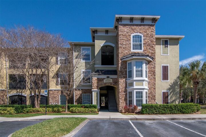 Property Photo:  9916 Courtney Palms Boulevard 103  FL 33619 