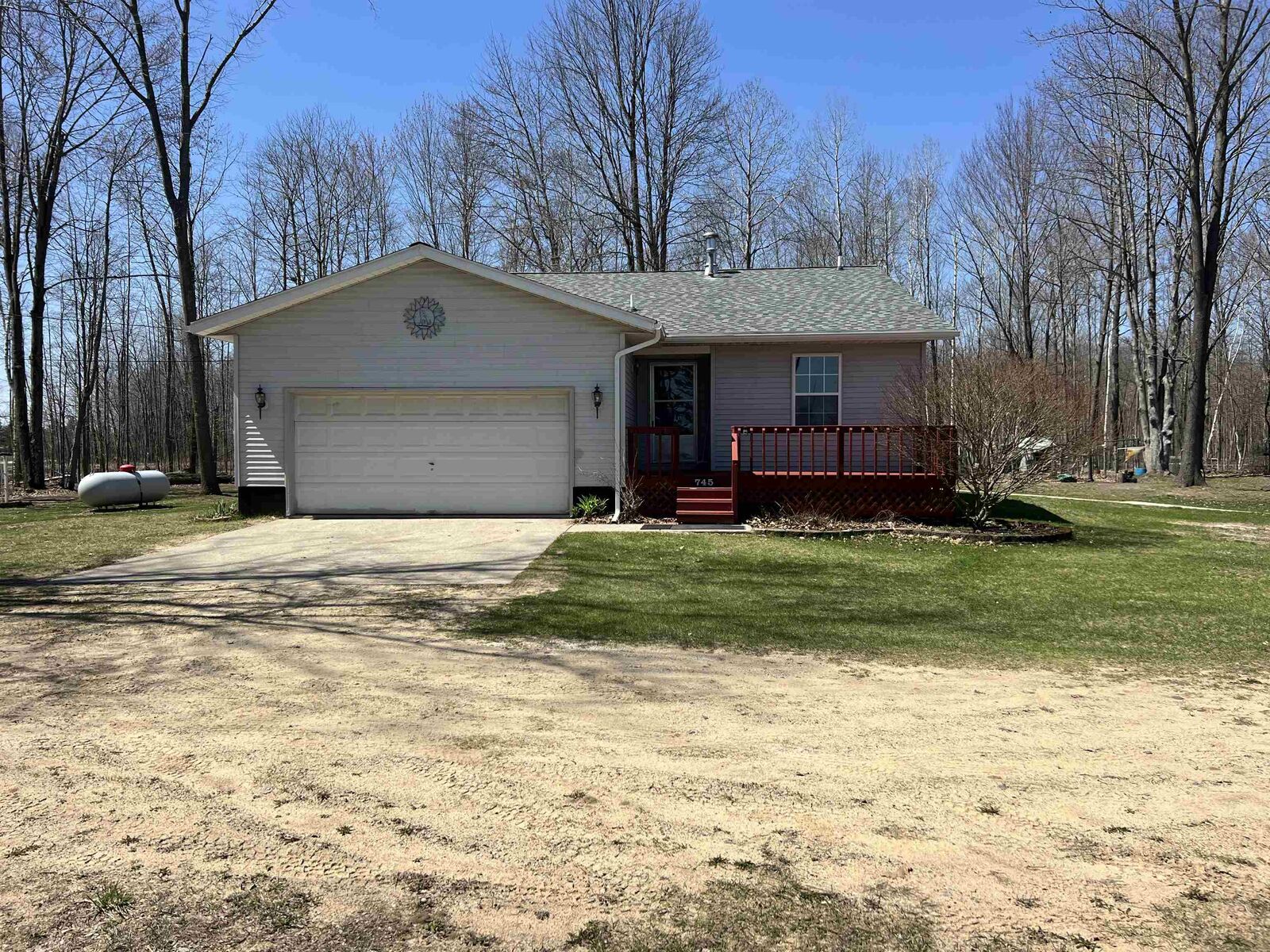 Property Photo:  745 Wolverine Drive  MI 48624 