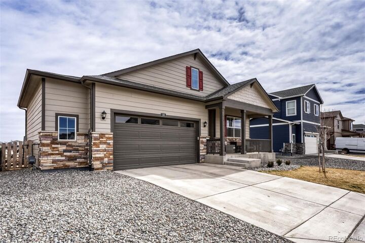Property Photo:  166 Racer Street  CO 80102 