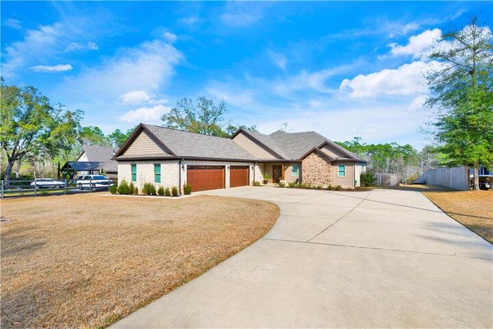 Property Photo:  9492 Neumann Drive  AL 36530 