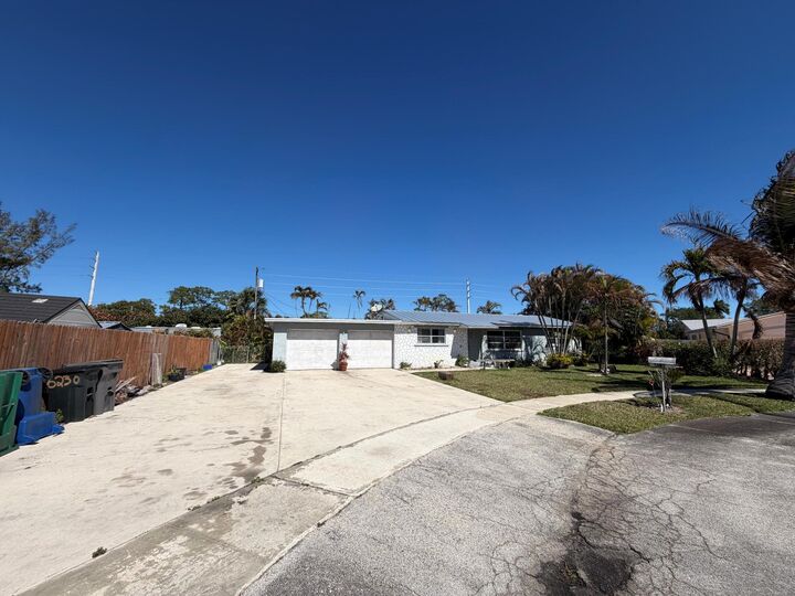 Property Photo:  5969 Pine Court  FL 33415 