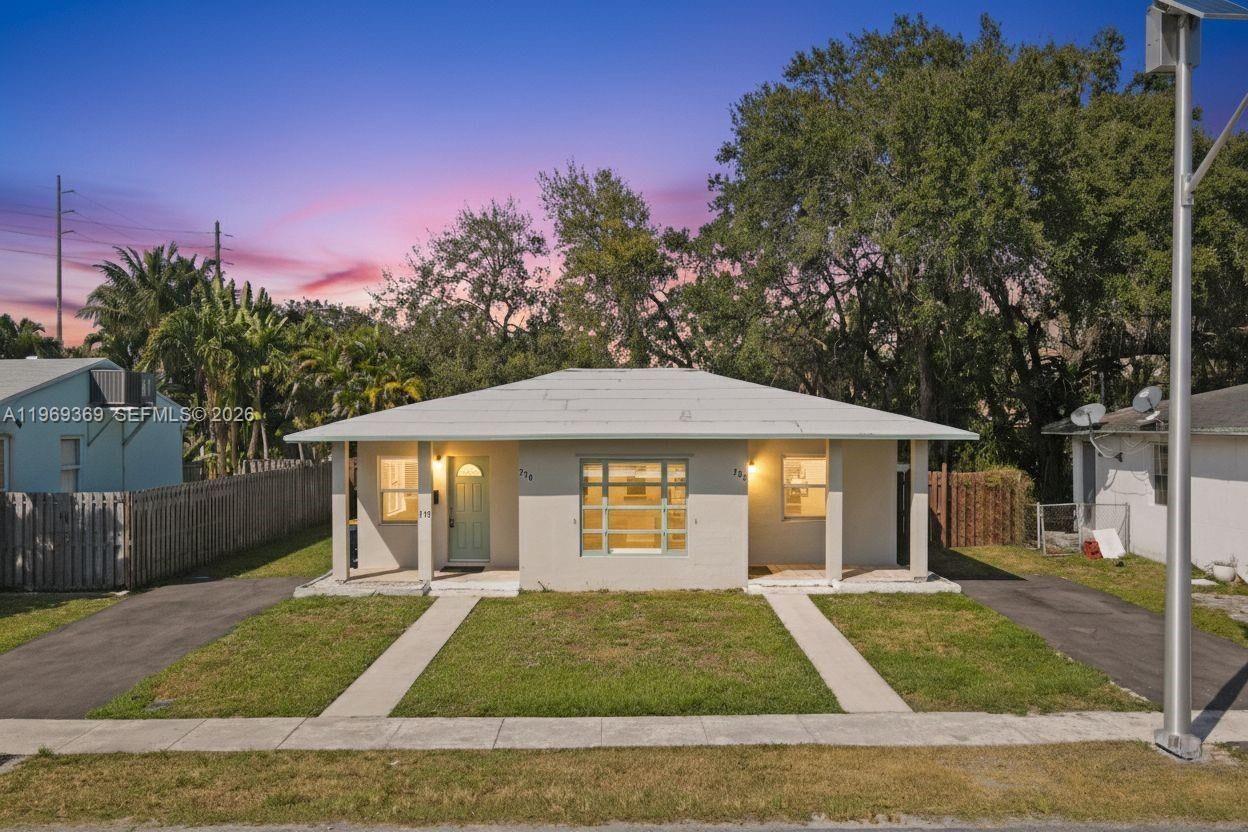 Property Photo: 208 SW 2nd Pl FL 33004