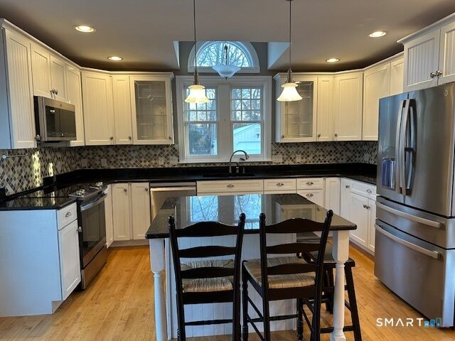 Property Photo:  1 Fernwood Street  CT 06109 