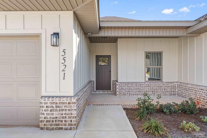 Property Photo: 5521 Chenier Dr FL 32563