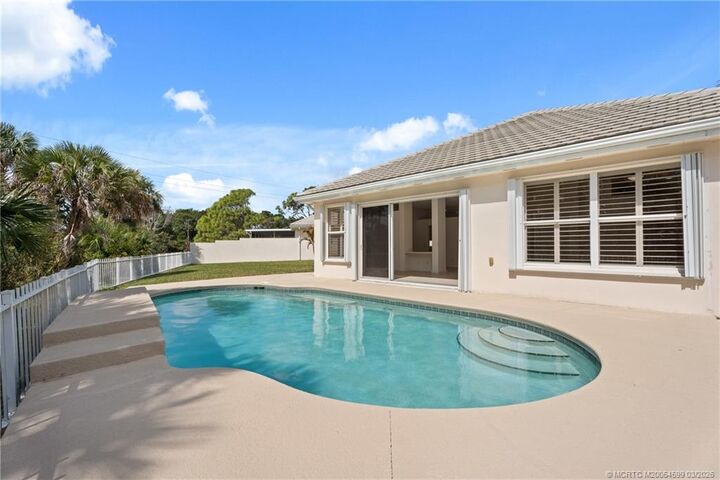 Property Photo:  7780 SE Needle Palm Circle  FL 33455 