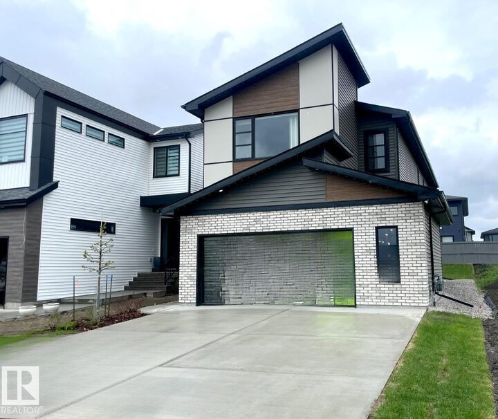 Property Photo: 7005 Kiviaq Crescent SW AB T6W 1A5