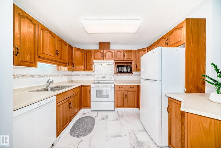 Property Photo: 13450 114 Avenue NW 302 AB T5M 4C4