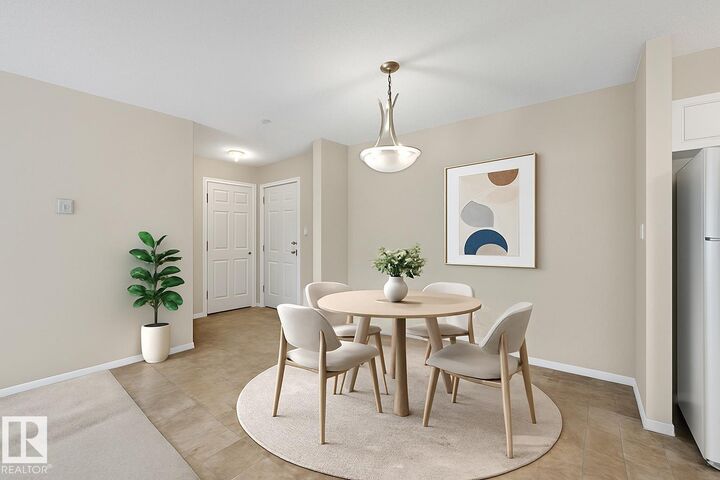 Property Photo:  13625 34 Street NW 216  AB T5A 0E3 