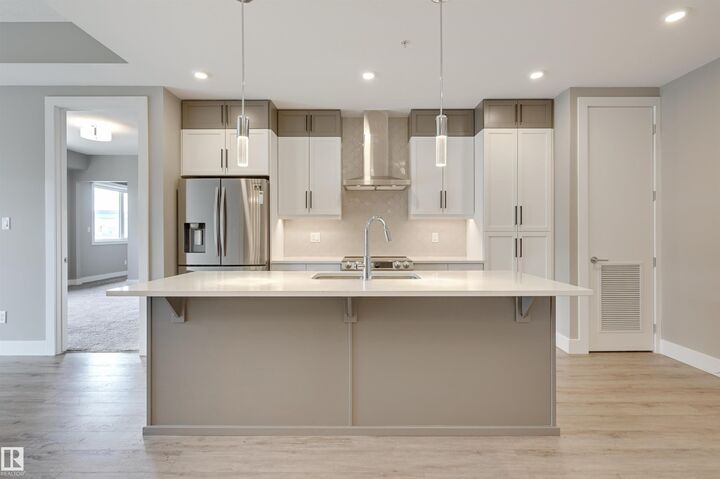 Property Photo:  528 Griesbach Parade NW 406  AB T5E 6X2 