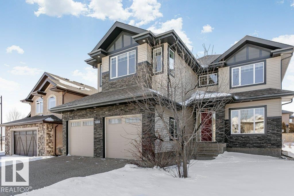 Property Photo: 1211 Adamson Drive SW AB T5W 0V5
