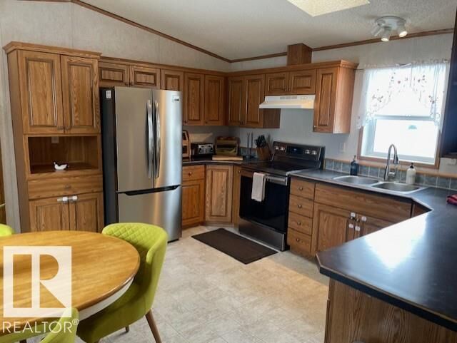 Property Photo: 328 Maple Wood Drive NW AB T6P 0A8