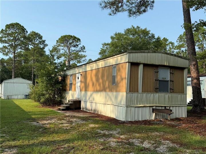 Property Photo:  64096 Mangano Road 117  LA 70452 