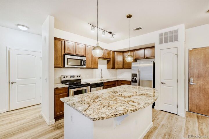 Property Photo:  13456 Via Varra 120  CO 80020 