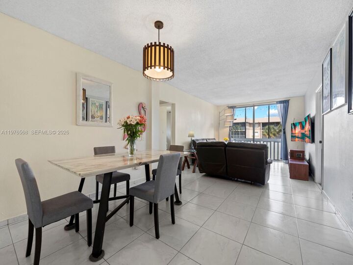 Property Photo:  6701 NW 169th St B304  FL 33015 