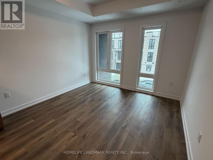 Property Photo: 3 Bancroft Lane 205 ON L4E 1M1