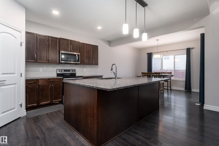 Property Photo:  1245 26A Street NW  AB T6T 2J4 