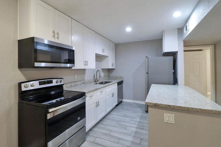 Property Photo:  5929 Queensloch Drive 235  TX 77096 