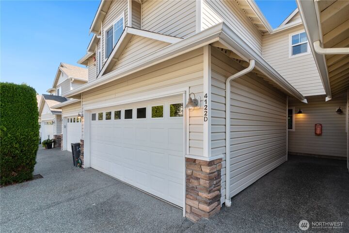 Property Photo:  4122  214th Street SW D  WA 98043 