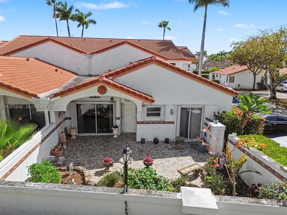 Property Photo:  15390 SW 76th Ter 105  FL 33193 