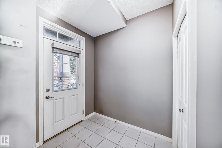 Property Photo: 3116 Arthurs Crescent SW AB T6W 2H7