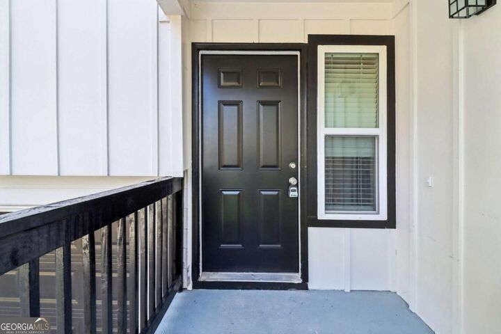 Property Photo:  105 Running Bear Trail  GA 30214 