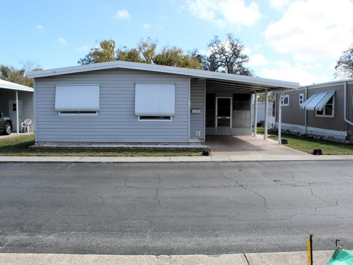 Property Photo:  2E Pindo Palm Street E  FL 33770 