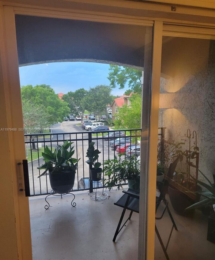 Property Photo:  11700 SW 2 13307  FL 33025 