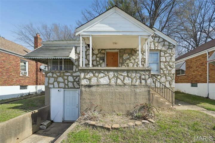 Property Photo:  6949 Claremore Drive  MO 63121 